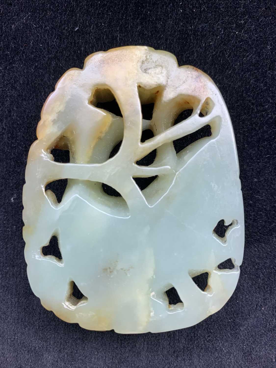 A Chinese carved & reticulated celadon jade ornament, depicting a bird & lingzhi, with russet - Image 4 of 14