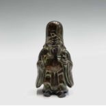 A small Chinese bronze figure of a Buddha holding a gourd, height 8cm.