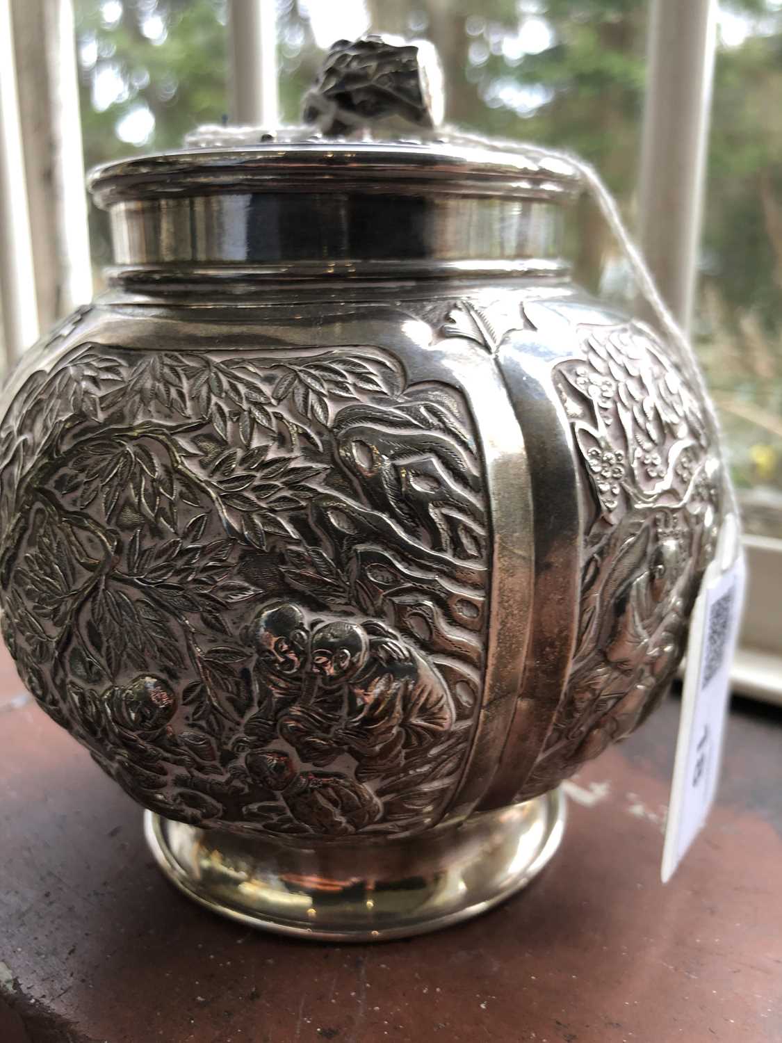 A Chinese silver globular tea caddy, the body with four shaped panels enclosing garden scenes - Image 8 of 12