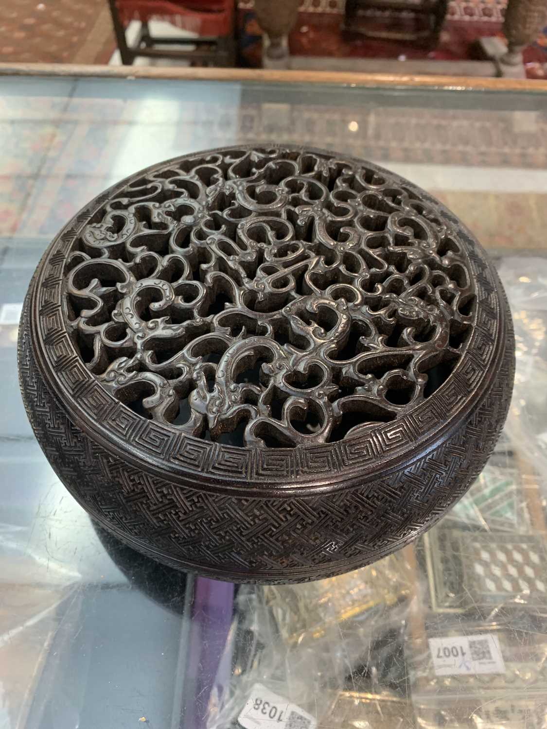 A Chinese Zitan wood circular box and cover, 18th century, the pierced cover carved with nine - Image 22 of 25