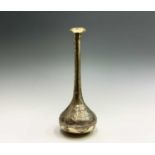 A Cairoware brass bud vase, early 20th century, the body with two panels enclosing silver inlaid