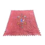 A Chinese design silk embroidered pink flannel bed cover, 259 x 230cm.