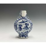 A Chinese blue and white porcelain moon flask, 19th century, with a circular panel to each side