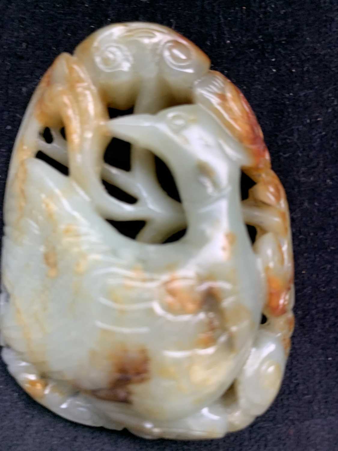 A Chinese carved & reticulated celadon jade ornament, depicting a bird & lingzhi, with russet - Image 3 of 14