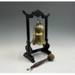 A Chinese hardwood framed bronze dinner gong, circa 1900, with hammer, height 37cm, width 20cm.