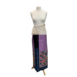 A Chinese silk embroidered wrap-around skirt, Qing Period, with coloured silk floral sprays and