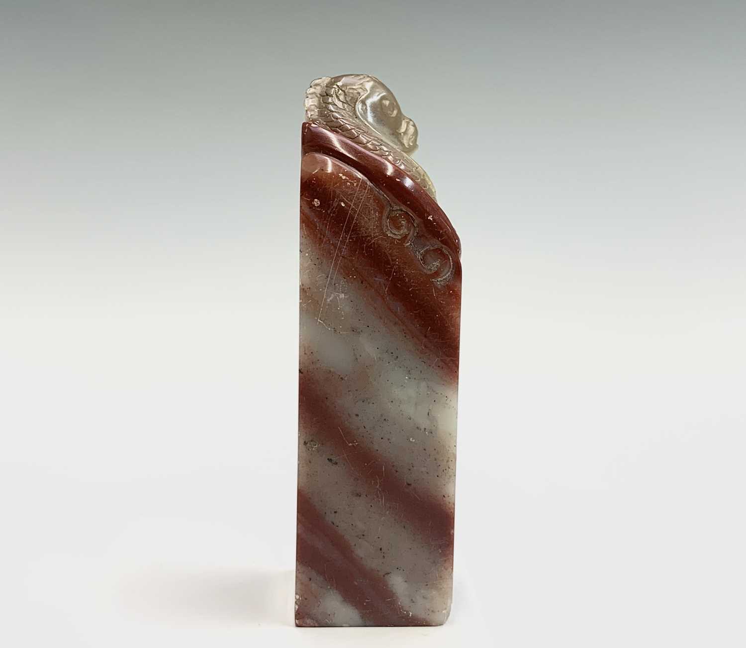 A Chinese hardstone seal, 19th century, surmounted by a carved carp, height 7.5cm. - Image 7 of 7