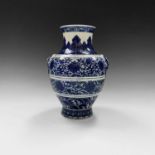A Chinese blue and white porcelain archaistic hu-form vase, Qianlong seal mark in underglaze blue,
