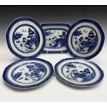 A Chinese export porcelain octagonal dish, 18th century, 19.5 x 28cm and four plates 23.5cm.