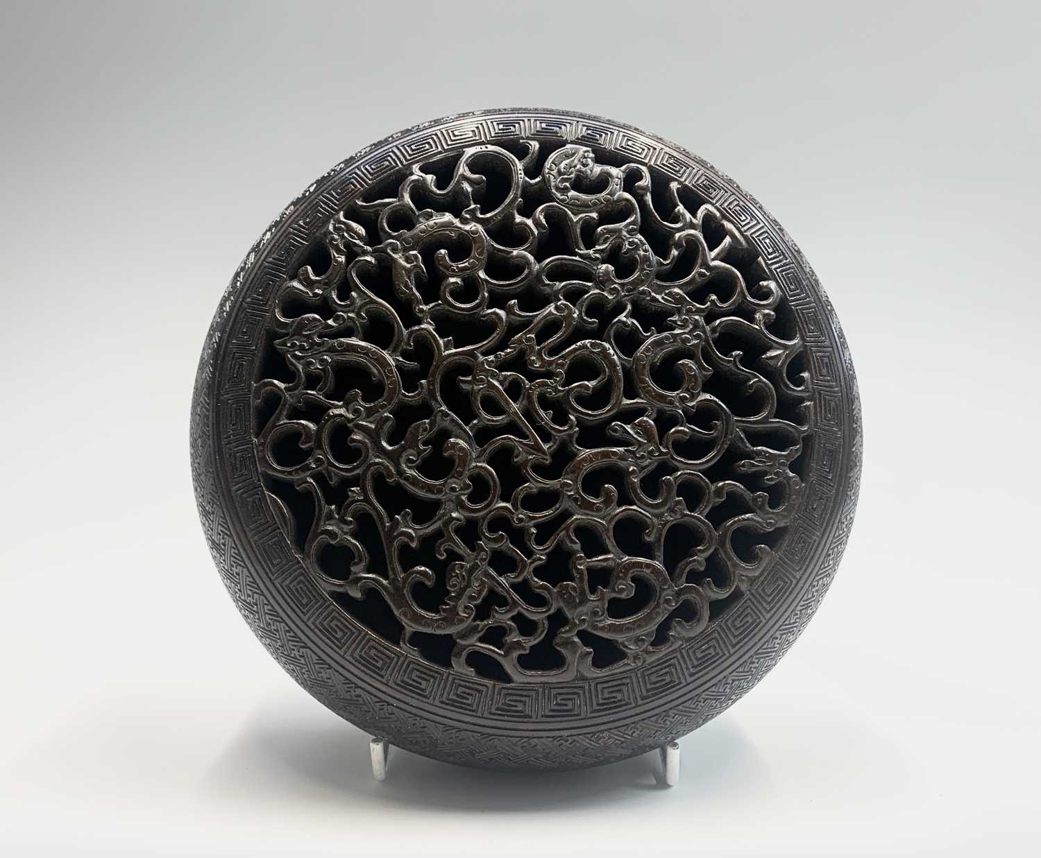 A Chinese Zitan wood circular box and cover, 18th century, the pierced cover carved with nine - Image 5 of 25