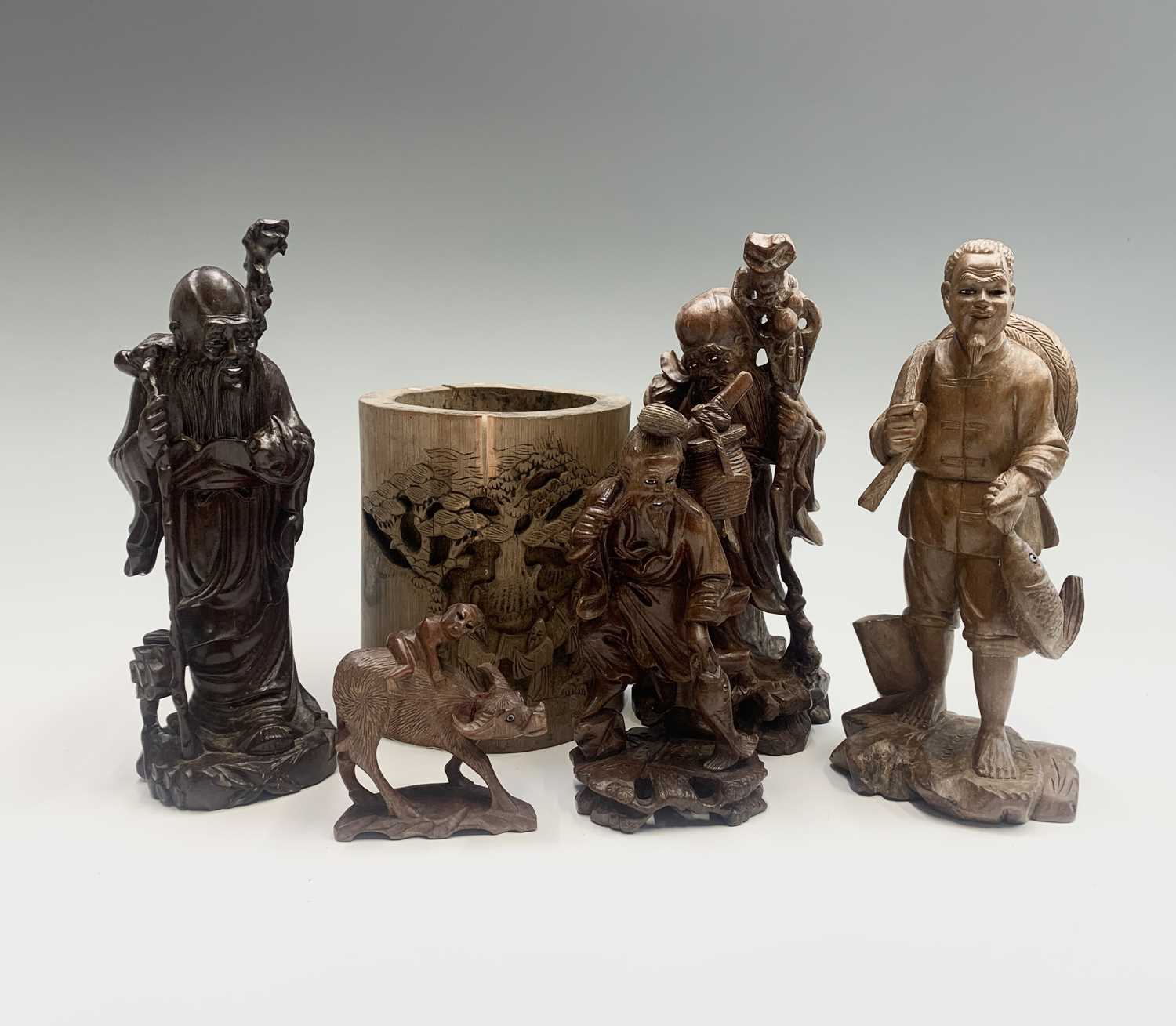 A Chinese hardwood figure of Shoulao, holding a peach and a staff, height 21cm, together with four - Image 13 of 13