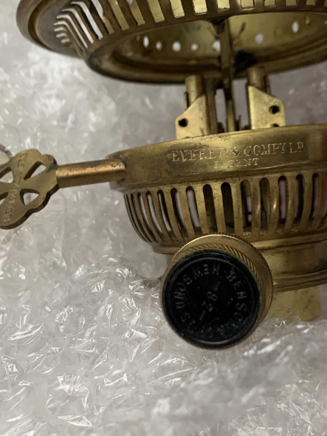 A pair of rare late Victorian Romany wall mounted brass cherub oil lamps, each with cranberry - Image 10 of 15