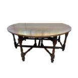 A large Titchmarsh and Goodwin oak gateleg dining table, 20th century, height 76cm, length 182cm,