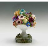 A Rare Royal Worcester urn of flowers ornament, modelled by Mary Leigh, pattern number z214, date