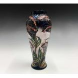 A Moorcroft 'Gypsy' pattern baluster vase, designed by Rachel Bishop, having tube lined floral