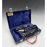 A Boosey & Hawkes Regent model B flat composition clarinet, number 445547, in hard case.