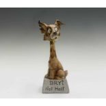 A 20th century bisque nodder ornament modelled as a cat, possibly a bar match holder, the base
