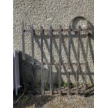 A wrought iron garden gate. Maximum height 108cm, maximum width 99cm.