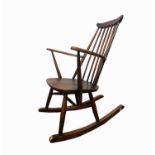 An Ercol rocking chair, height 86cm, width 61cm.