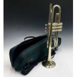 A Boosey & Hawkes B & H 400 brass trumpet, in green bag.