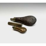 A 19th century copper and brass small powder flask, length 8cm, another powder flask and a