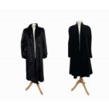A quality ranch mink fur coat, label size 16, and a black velvet swing coat (2). Condition report: