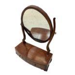 A mahogany bow front dressing table mirror, early 19th century, height 57cm, width 43cm.