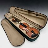 A Chinese Antoni violin, model ACV31, with bow in soft case.