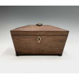 A Regency mahogany tea caddy, the interior with two lidded compartments and aperture for a mixing