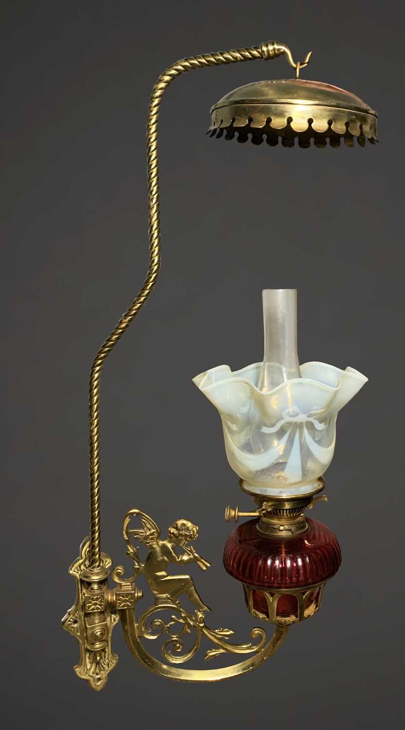 A pair of rare late Victorian Romany wall mounted brass cherub oil lamps, each with cranberry - Image 2 of 15