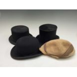 A small top hat by Samuel Mortlock & Son of Gracechurch St, together with a Wegener top hat, a