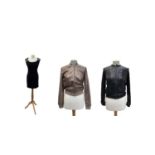 A gold sequinned bomber jacket and a black sequinned bomber jacket both approx size 10 or small.