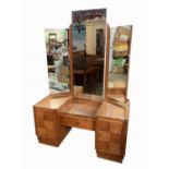 An Art Deco style teak dressing table, 20th century, height 175.5cm, width 120cm, depth 56cm.