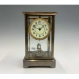 A German four glass torsion mantel clock, circa 1900, the enamel dial decorated floral garlands,