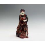 A scarce early Royal Doulton figure, 'One of the Forty', designed by Harry Tittensor, having printed