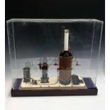 A Maxwell Hemmens of York precision scale model of a vertical marine stem plant, with mahogany