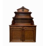 A Victorian mahogany chiffonier, the back with two shelves above two frieze drawers and a pair of