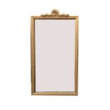 A giltwood rectangular wall mirror, 19th century, 67 x 34cm.