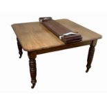 A late Victorian mahogany extending dining table, with two extra leaves and a winder, height 73cm,