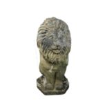 A reconstituted stone sculpture of a lion, height 48cm, and a gold painted garden urn, diameter 43cm