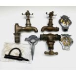 Two brass Royal Doulton taps, another brass tap, a Middle Eastern lock, a Singapore AA badge and
