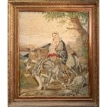 A 19th century Berlin woolwork panel, depicting 'The Flight into Egypt'. 75cm x 62cm.Condition