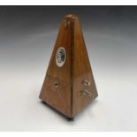 A German made 'System Maelzel' metronome. Height 22cm.