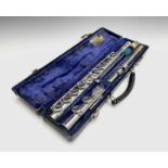 A silver plated concert flute, by Gemeinhardt, Elkhart, number D82848, in original hard case.
