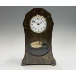 A German Jugendstil brass cased torsion mantel clock, early 20th century, the case of industrial