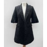 Black velvet bolero size 12 and a black, 3/4 length sleeve long jacket by BCBGMAXAZRIA, size S.