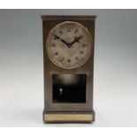 An unusual German tin cased torsion clock, early 20th century, the silvered dial with Arabic