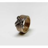 An Era 14ct gold rope coil ring with a cross of diamonds set in white gold 8.1gmCondition report: