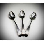 Three silver spoons.