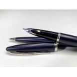 A Waterman Careine mat black fountain pen with 18ct gold nib and a matching ballpoint pen